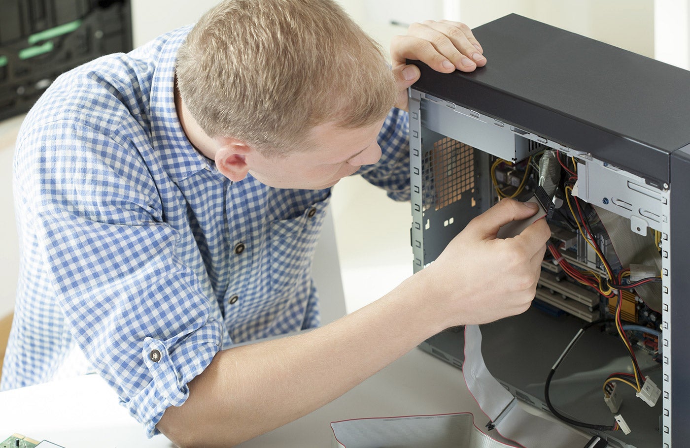 A computer is being fixed after a breakdown.