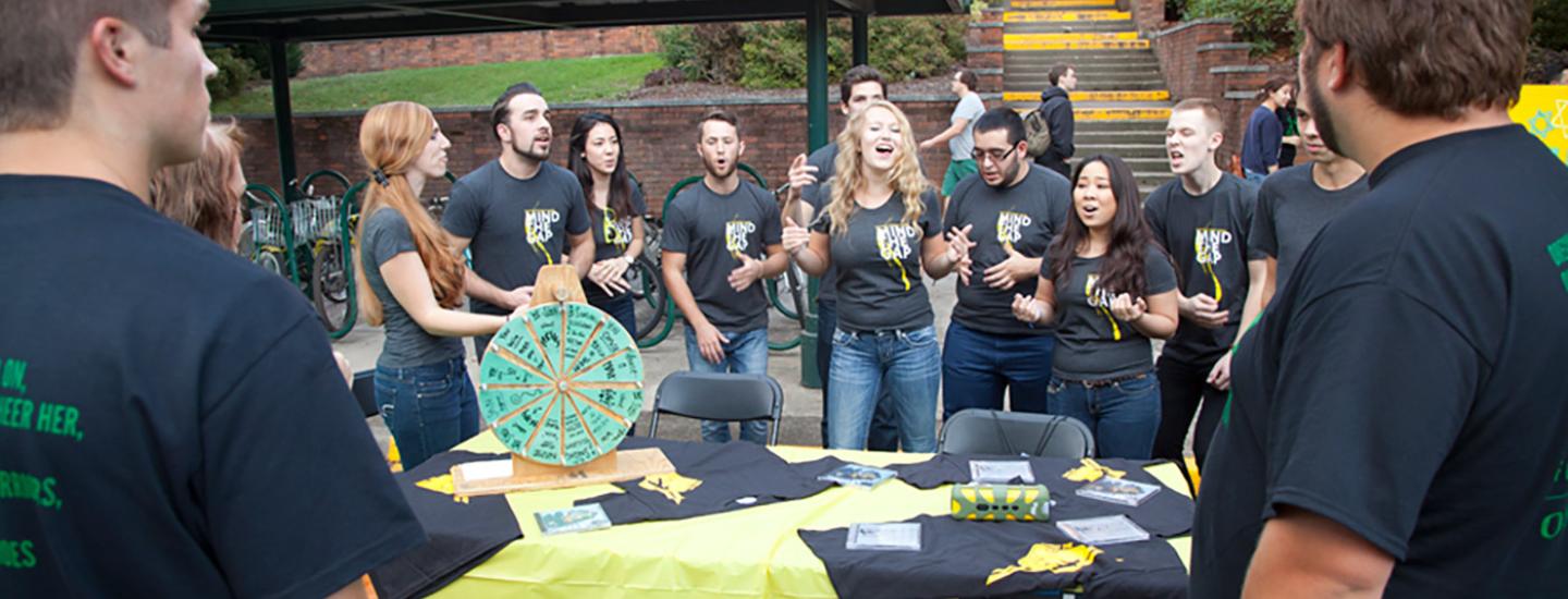 Large group of students promoting the Student Organization Mind the Gap.